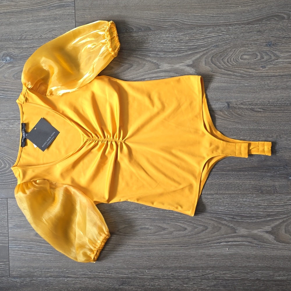Yellow/gold bodysuit with puffy sleeves size xs
